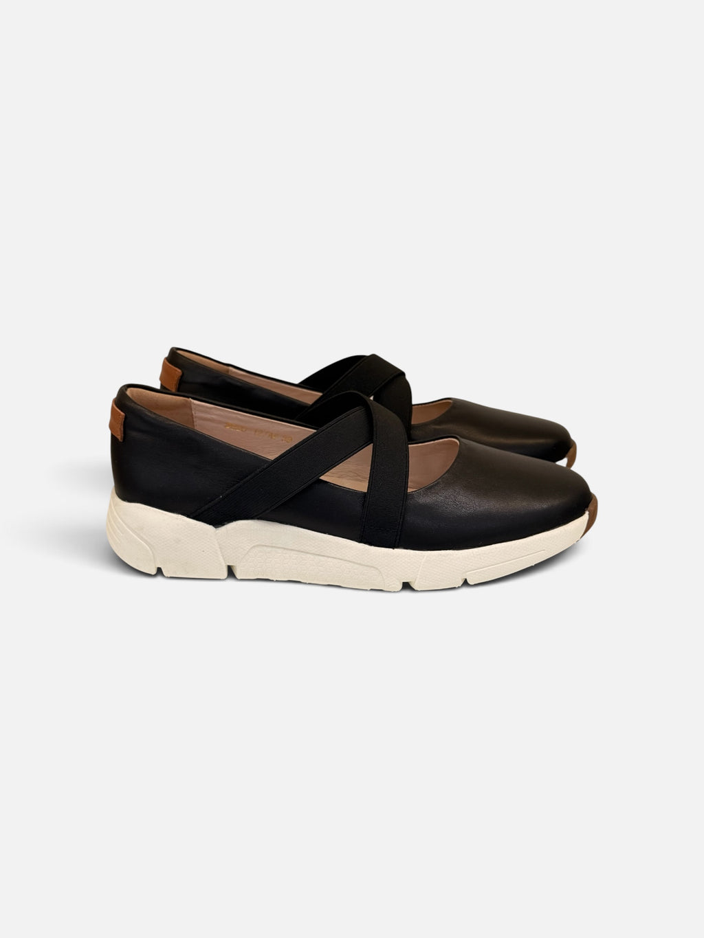 Black Leather Flats with Crisscross Straps and White Sole